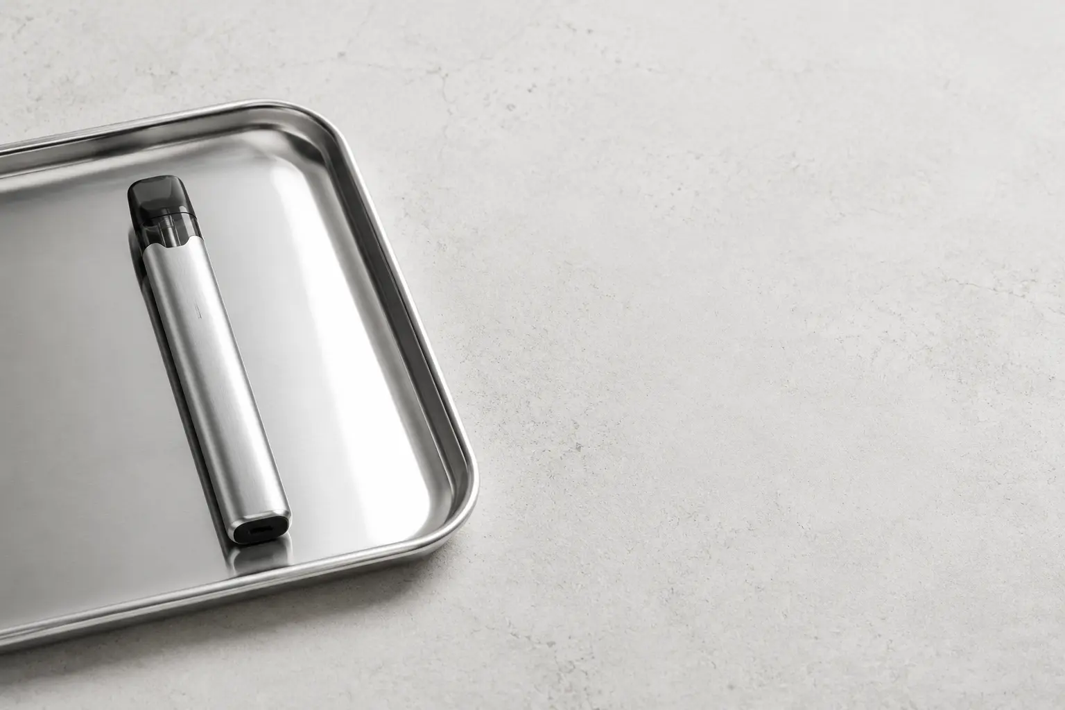 A precision pod device arranged on a white studio desk